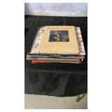 Stack of records w/ books