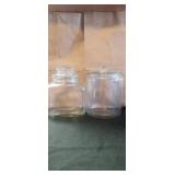2 glass dishes with lids