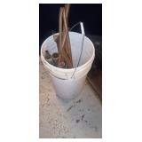 Bucket full of copper piping
