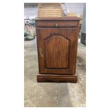 Side table with moveable magazine rack