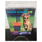 Pooper scooper swivel bin and rake