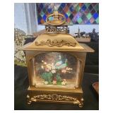Peacock ?? lantern water ?? and glitter globe