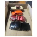 4 die cast cars