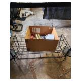Box of items and a rack