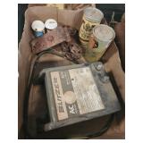 Electric fence, trolley and old beer cans