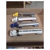 4 metal oil  & gas semi truck and trailers