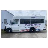 2012 CHEVY RED WHITE BLUE BUS