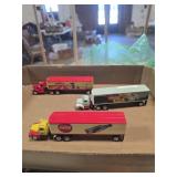 3 metal Coca-Cola semi truck and trailers 1