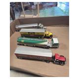 4 metal oil & gas semi truck and trailers