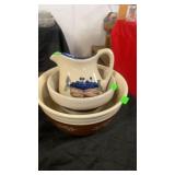 Stoneware, two bowls and a pitcher