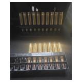 20 empty  30-06 shells and 14 rounds of  243 win