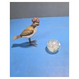 Decorative bird figurine and clear glass paper