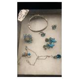 Bracelet necklace, earrings, and ring