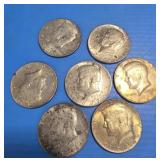 7 silver half dollars