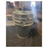 4 small metal buckets