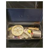 Small tackle box full of fishing gear