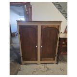 Primitive storage cabinet