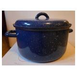 This is a blue speckled enamel stock pot by