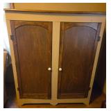 rustic country-style cabinet featuring painted