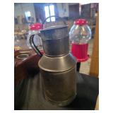 Antique tin milk storage container