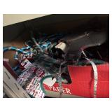 Box of dog leashes and harness