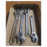 Adjustable wrenches