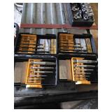 2 sets of screw extractors