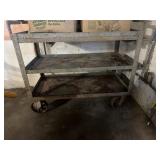 Metal cast iron cart on wheels