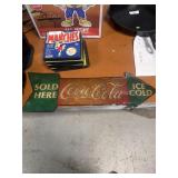 1930s-style die-cut porcelain Coca-Cola arrow