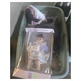 Tote full of porcelain dolls
