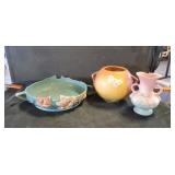 Hull and Roseville dishes , two cracked