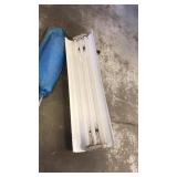 Metal shop light. Part of tent
