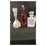 2 glass decanters. Small bottles