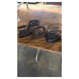3 irons and holder