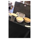 Old pans. Chipped bowl. Sifter. Cow
