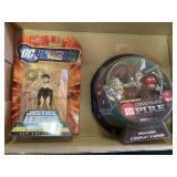 M&M figures and super woman action figure