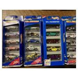 Four hot wheels 5 packs