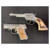 Two vintage cap guns