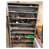 Cabinet and Contents of Lathe Chuck’s, Machine Steel and Other Assorted Items. Bring Boxes for removal.