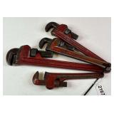 3 Ridgid Pipe Wrenches and 1 Erie Tool Works Pipe Wrench.