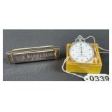 Stop Watch and Marine Band Harmonica