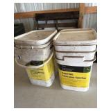 Seed flow lubricant, one with graphite one without