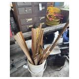 Bucket of yard sticks