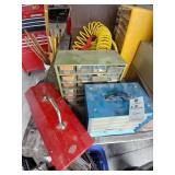 Shelves with fuses and a tool box with tools