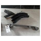 Sweep, grippers and cross brace