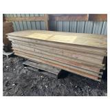 Stack of 8ï¿½ wood banquet tables (7)