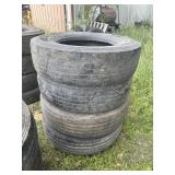 Stack of 295/75R22.5 tires (4)