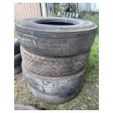 Stack of 295/75R22.5 tires (4)