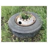 Bridgestone 295/75R22.5 tire on rim