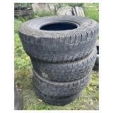 Stack of LT285/75R16 tires (4)